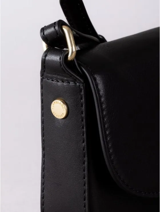 Tarnbeck Small Leather Flapover Cross Body Bag in Black